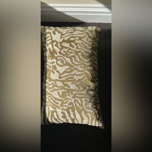Gold and cream decorative pillow w design